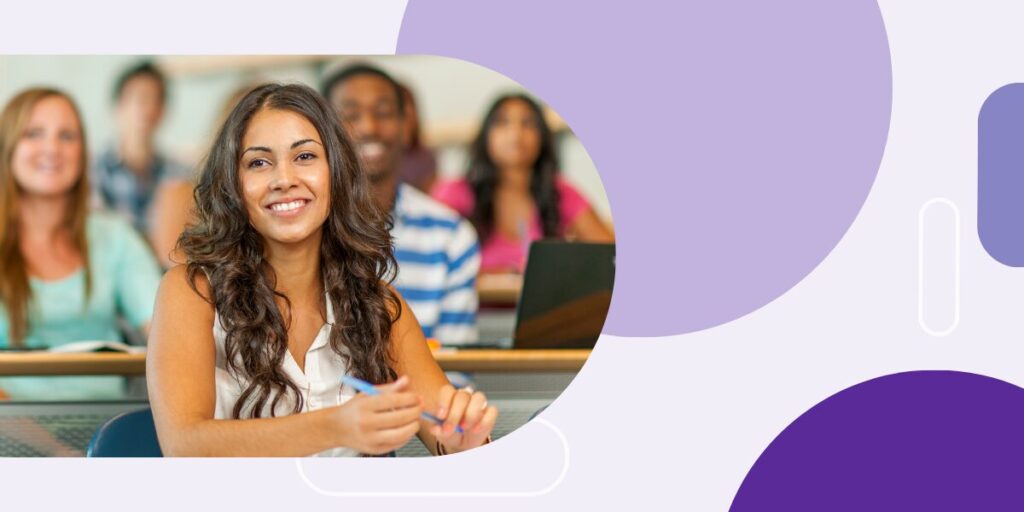 Photo of student smiling in a classroom setting
