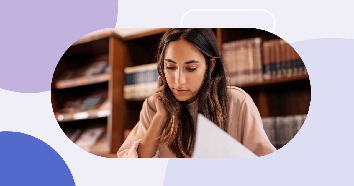 Woman looking at documents at a desk