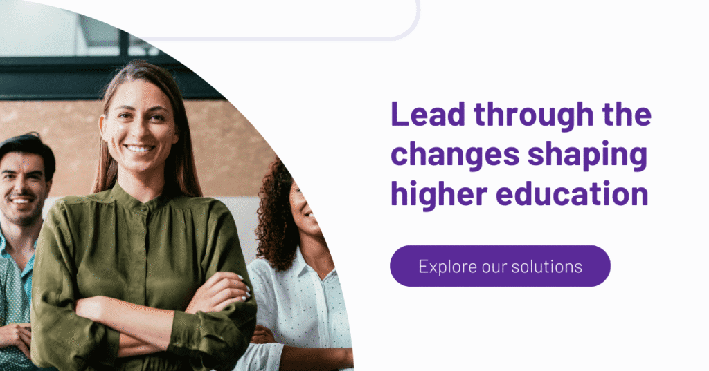 Higher education leaders smiling together in a professional setting